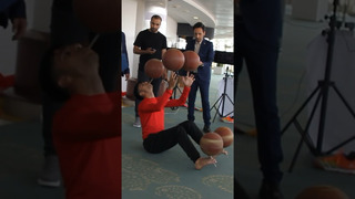 Longest time spinning 5 basketballs – 10.35 seconds by Ali Souri