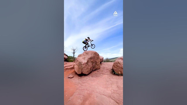 Biker Jumps On Giant Rocks