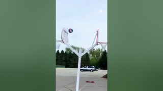 Guy Bounces Basketball Off Wall and into the Basket