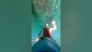 Kayaker Performs Butterfly Roll to Go Underwater