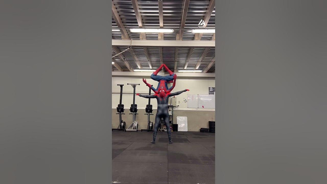 Superhero Duo Takes on Balancing Act in Epic Costume Attempt