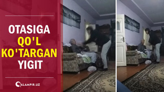 Otasiga qo’l ko’targan yigit