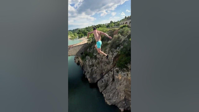 Daredevil Jumps Off Tall Bridge