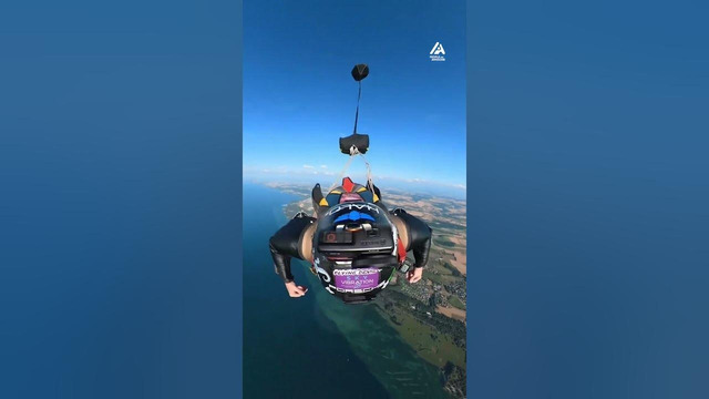 Group of Skydivers Fly Over Beautiful Landscape | People Are Awesome