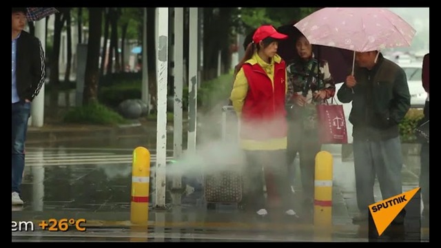 В Китае установили светофор, поливающий водой пешеходов-нарушителей