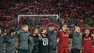 Liverpool FC. The players and the Kop sing YNWA in unison