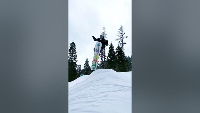 Person Performs Awesome Snowboarding Tricks