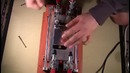 Аппарат для снятия защитного стекла с дисплея телефона в работе