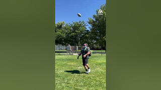 Guy Kicks Rugby Ball and Puts it Inside His Backpack