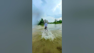 Daring to defy gravity: Watch as he conquers the river with his flawless backflips