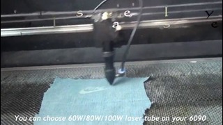 Laser Engraving Machine working on glass and jeans