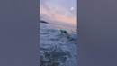 Guy Displays Skimboarding Tricks on Sea