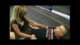 Frank Mir shows the omoplata on Joanne of MMA Girls