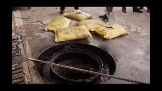 Как в Китае вырезают люки в асфальте