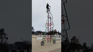 The tallest bicycle looks like a Christmas tree