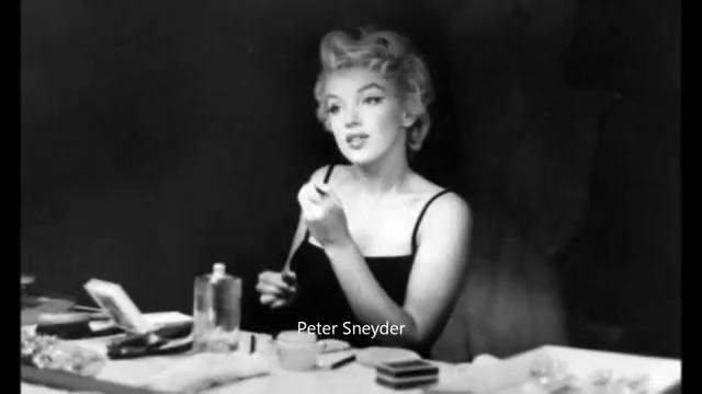 Marilyn Monroe – Putting on Make up Backstage, By Sam Shaw 1954