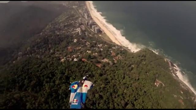 Wingsuit gliding over Pedra da Gávea in Rio de Janeiro