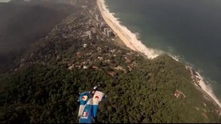 Wingsuit gliding over Pedra da Gávea in Rio de Janeiro