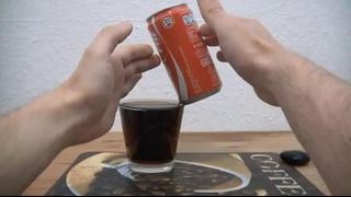 Coke Can balancing on edge of a glass WOW