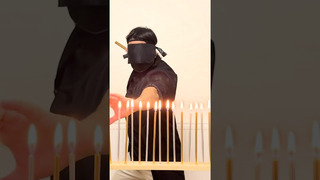 Most candles extinguished with nunchaku strike while blindfolded – 28 by Chirag Lukha