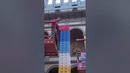 Building the tallest domino tower